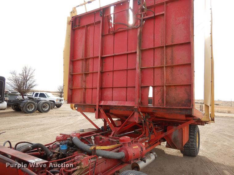 image for item DN6320 New Holland 1049  bale stacker