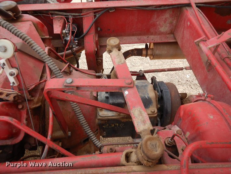 image for item DN6320 New Holland 1049  bale stacker