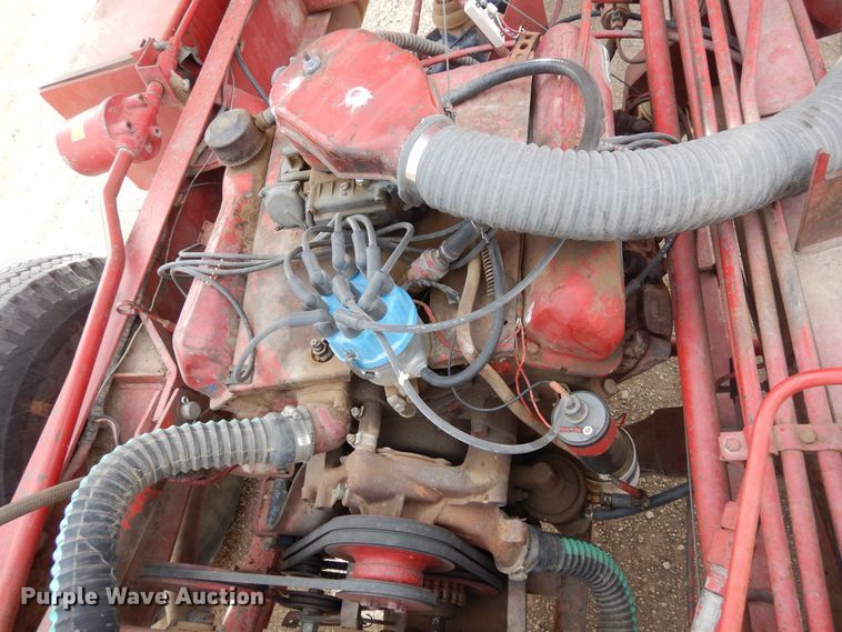 image for item DN6320 New Holland 1049  bale stacker