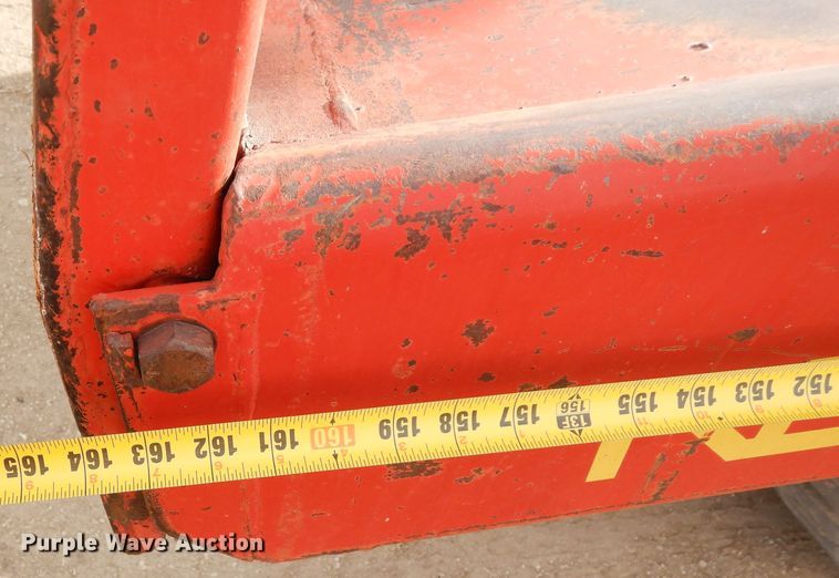 image for item DN6320 New Holland 1049  bale stacker