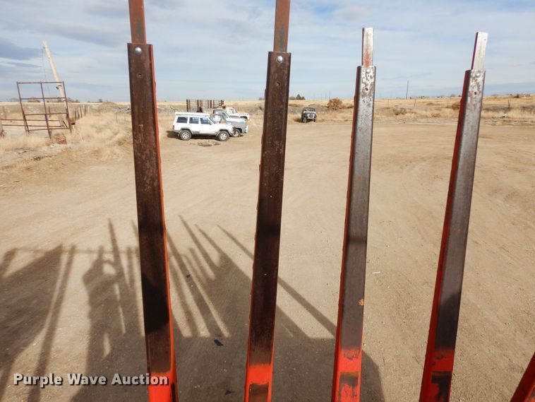 image for item DN6320 New Holland 1049  bale stacker