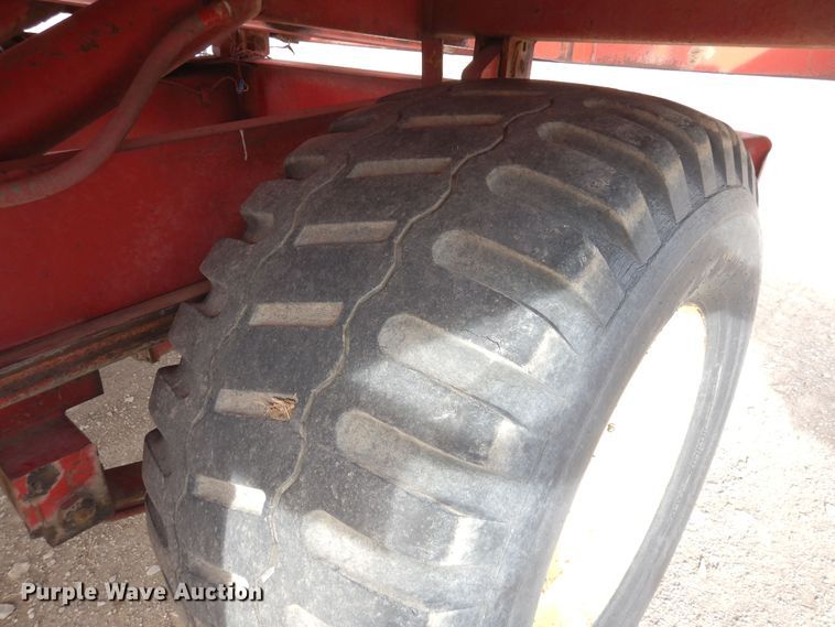 image for item DN6320 New Holland 1049  bale stacker