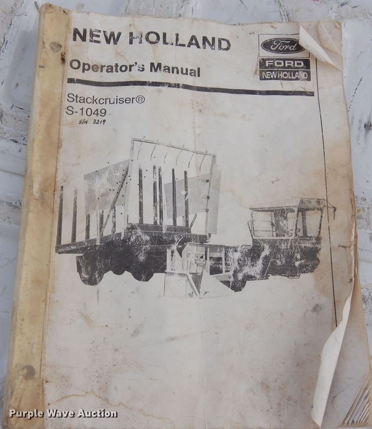 image for item DN6320 New Holland 1049  bale stacker