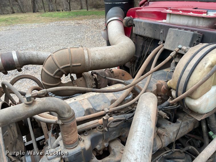 image for item MM9363 2000 Mack RD688S  roll-off container truck