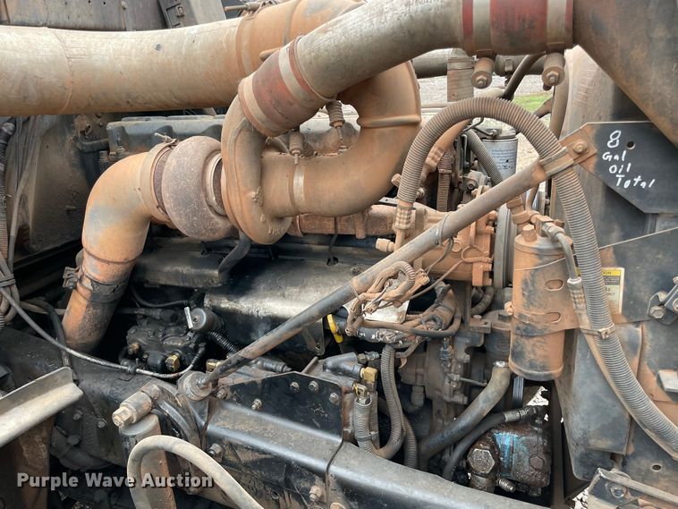 image for item MM9363 2000 Mack RD688S  roll-off container truck