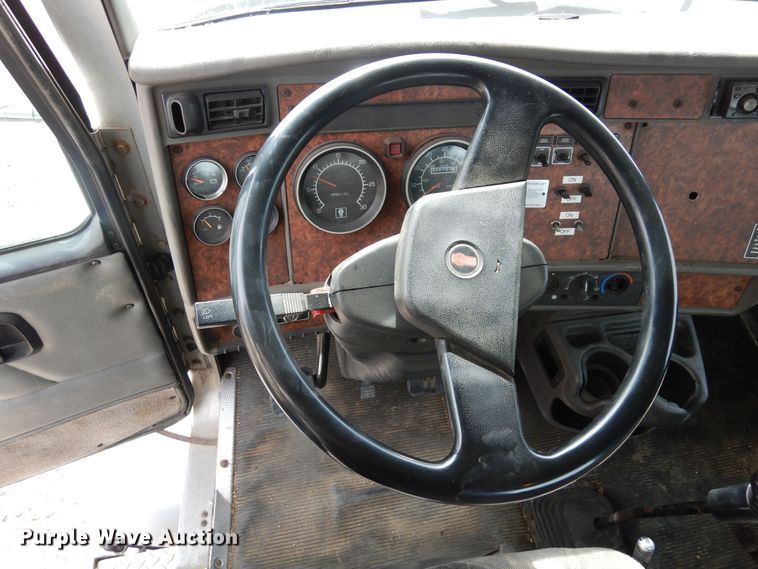 image for item DN6319 2003 Kenworth T300  rollback truck