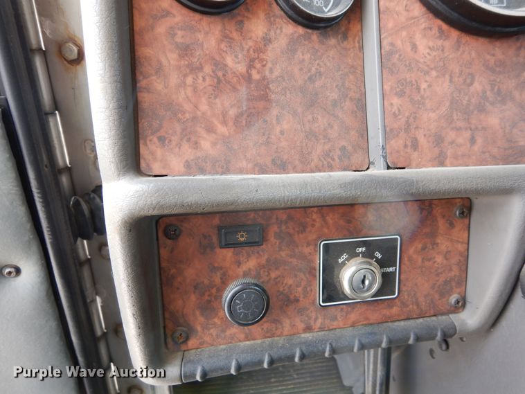 image for item DN6319 2003 Kenworth T300  rollback truck