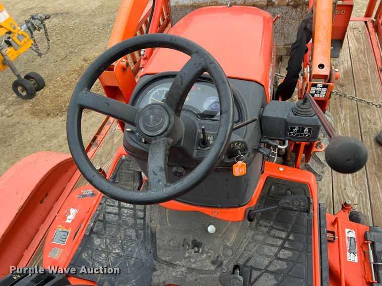 image for item KR9527 Kubota BX2670 tractor with 2017 Kubota trailer