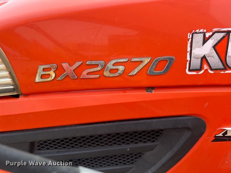 image for item KR9527 Kubota BX2670 tractor with 2017 Kubota trailer