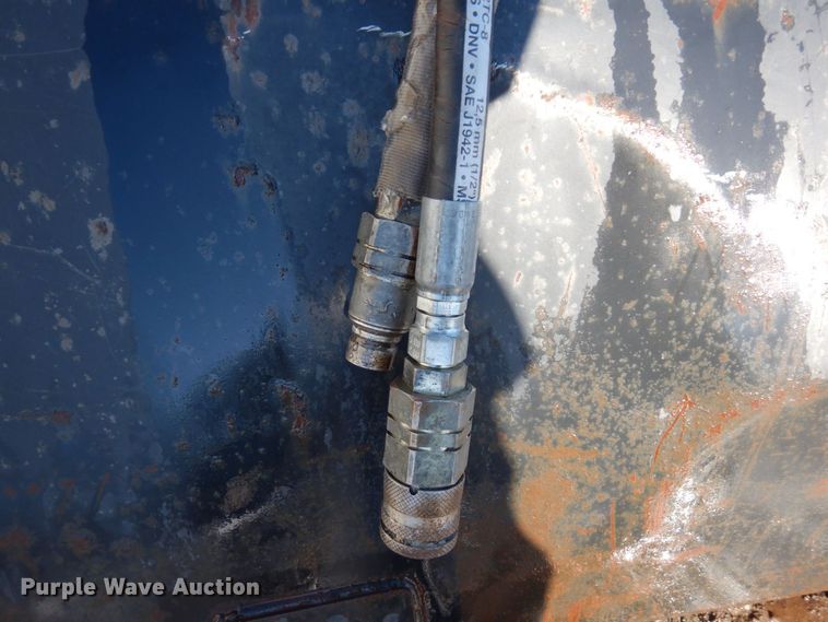 image for item KU9853 Caterpillar  skid steer sweeper