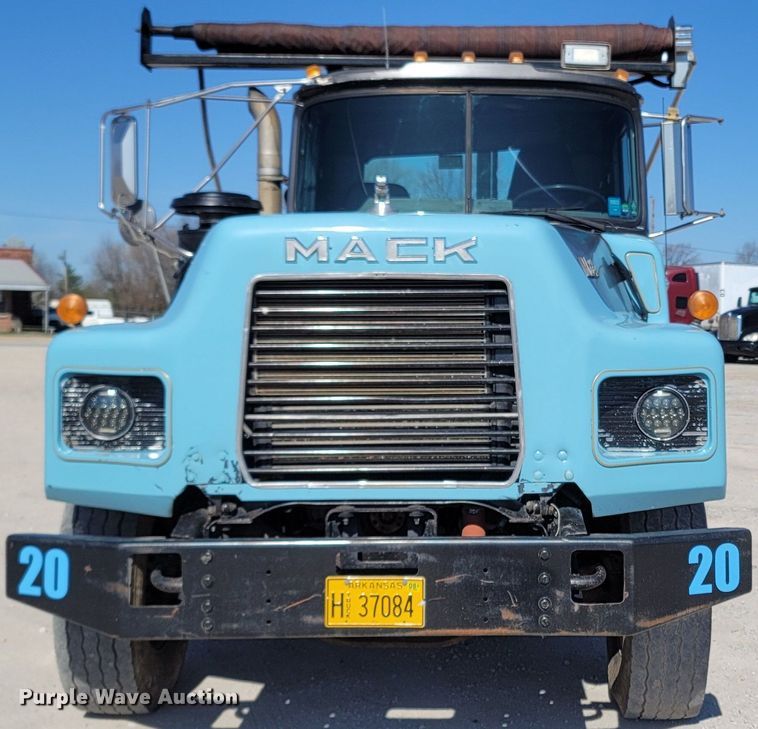 image for item MB9868 1997 Mack DM690S  roll-off container truck