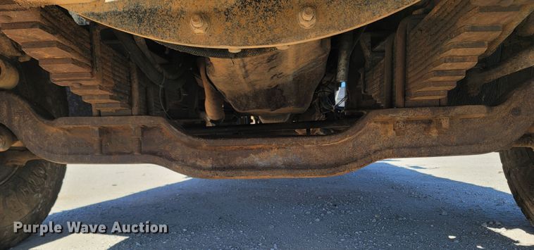 image for item MB9868 1997 Mack DM690S  roll-off container truck