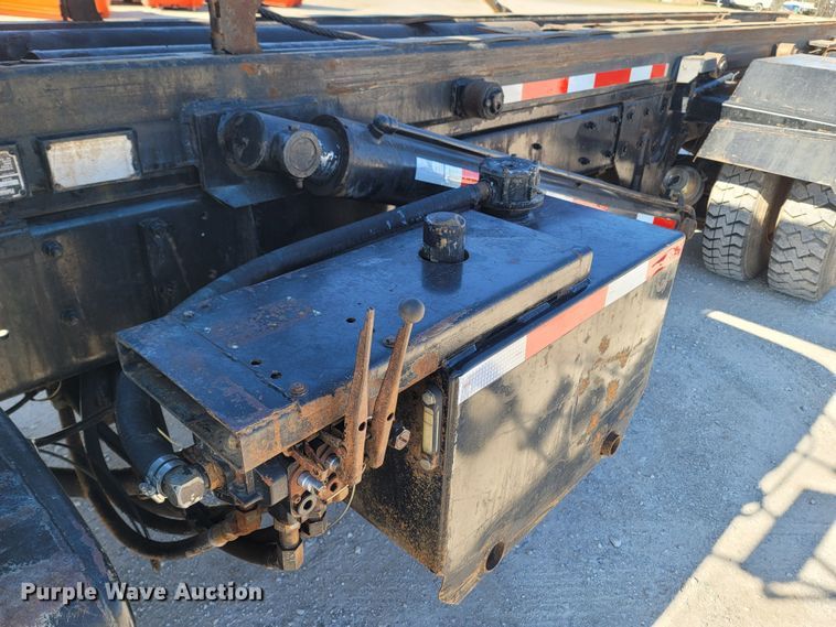 image for item MB9868 1997 Mack DM690S  roll-off container truck