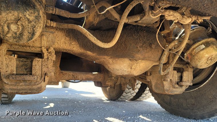 image for item MB9868 1997 Mack DM690S  roll-off container truck