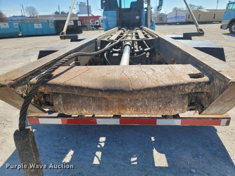 image for item MB9868 1997 Mack DM690S  roll-off container truck