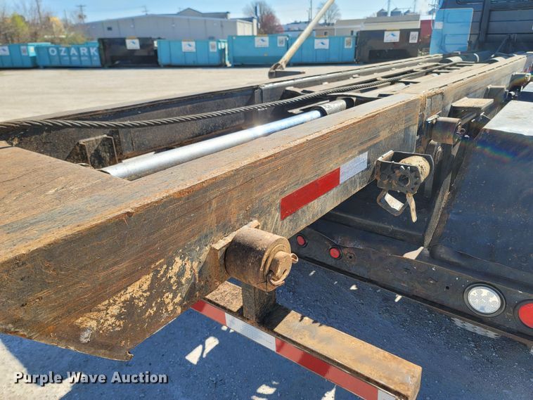 image for item MB9868 1997 Mack DM690S  roll-off container truck