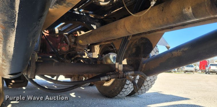 image for item MB9868 1997 Mack DM690S  roll-off container truck