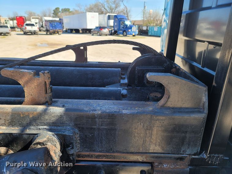 image for item MB9868 1997 Mack DM690S  roll-off container truck