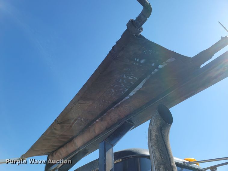 image for item MB9868 1997 Mack DM690S  roll-off container truck