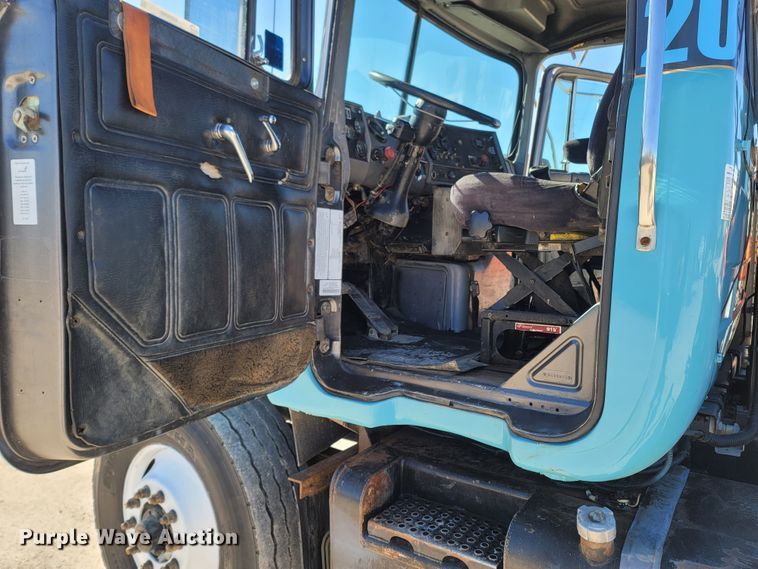 image for item MB9868 1997 Mack DM690S  roll-off container truck