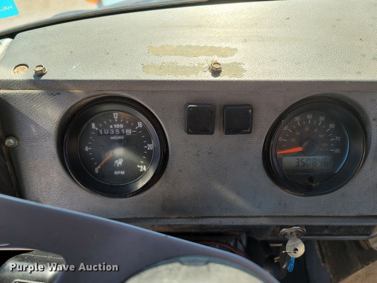 image for item MB9868 1997 Mack DM690S  roll-off container truck