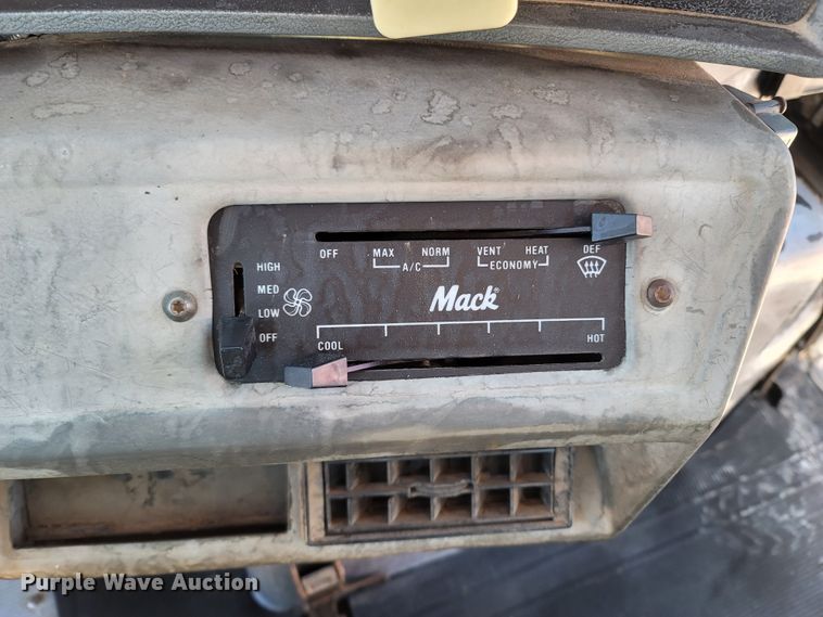 image for item MB9868 1997 Mack DM690S  roll-off container truck