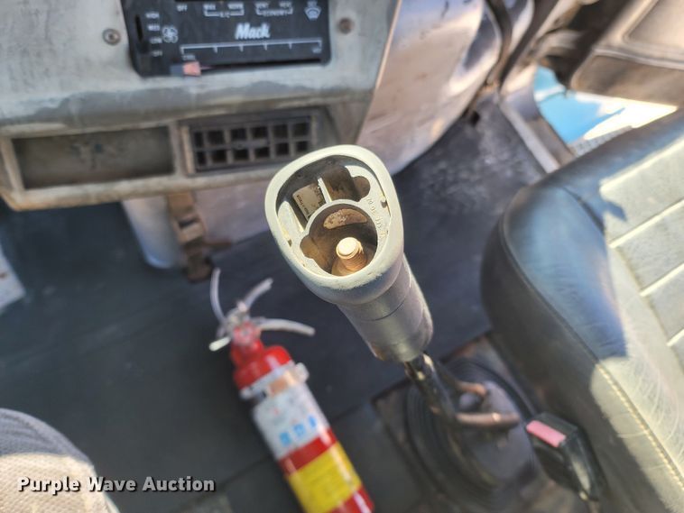 image for item MB9868 1997 Mack DM690S  roll-off container truck