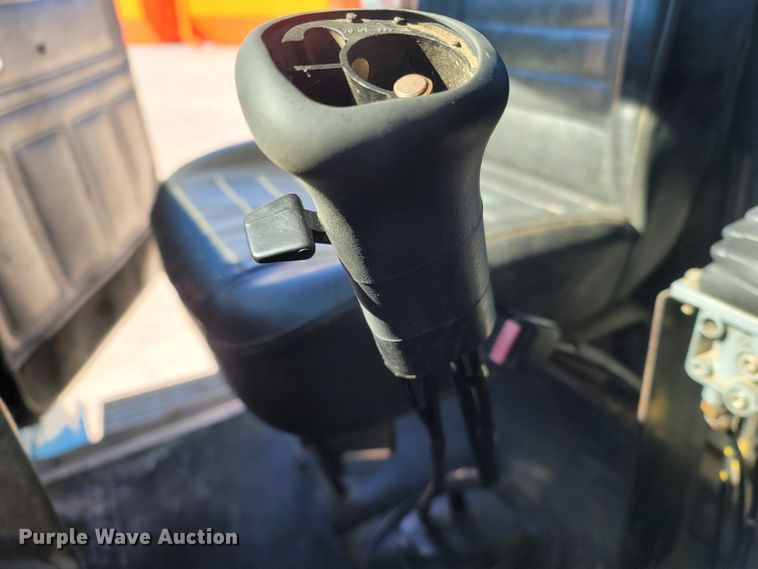 image for item MB9868 1997 Mack DM690S  roll-off container truck