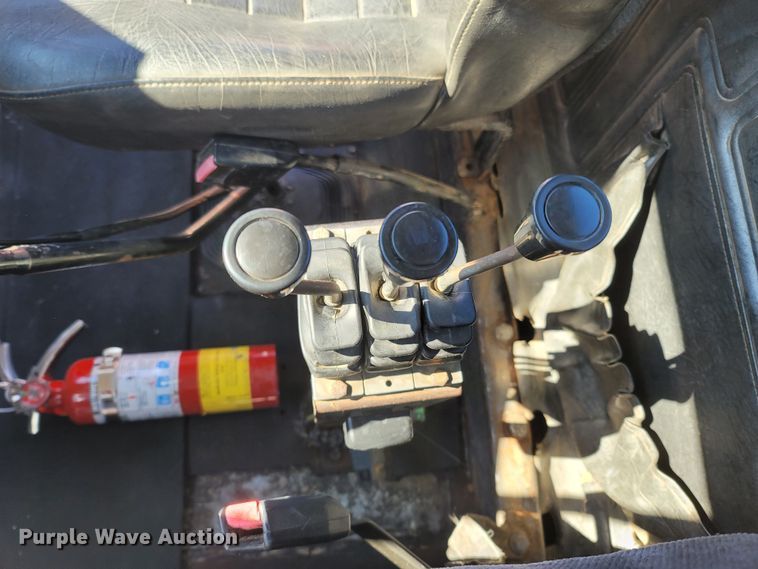 image for item MB9868 1997 Mack DM690S  roll-off container truck