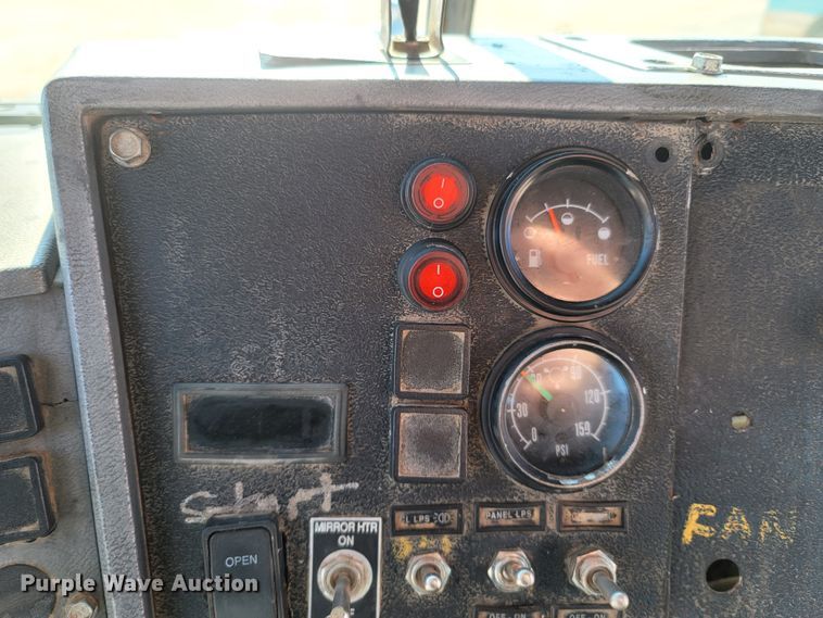 image for item MB9868 1997 Mack DM690S  roll-off container truck