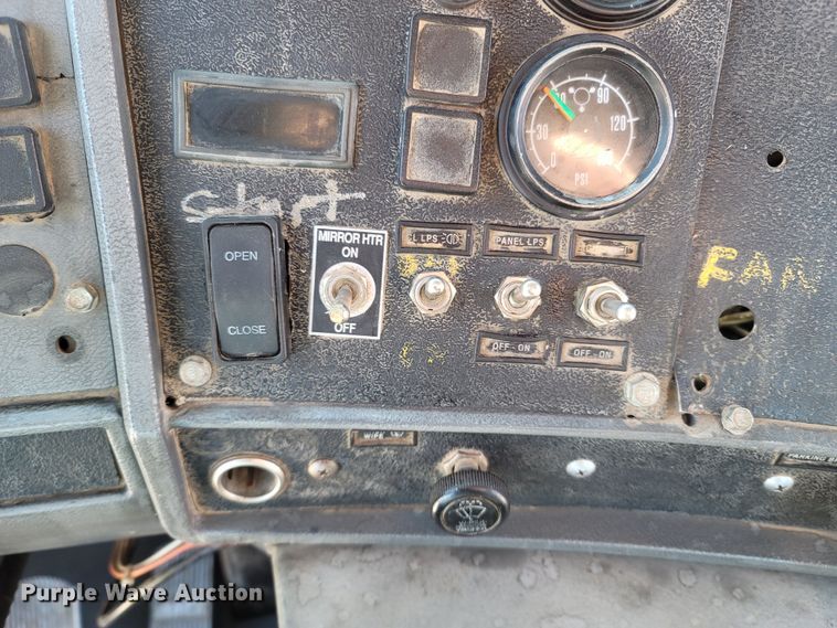 image for item MB9868 1997 Mack DM690S  roll-off container truck