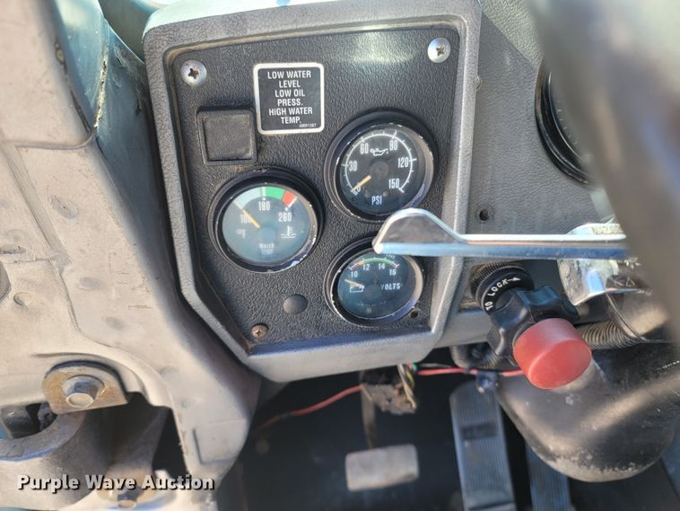 image for item MB9868 1997 Mack DM690S  roll-off container truck