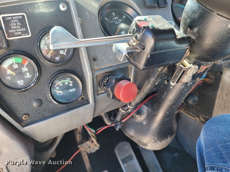 image for item MB9868 1997 Mack DM690S  roll-off container truck