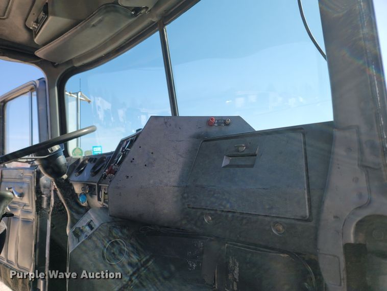 image for item MB9868 1997 Mack DM690S  roll-off container truck