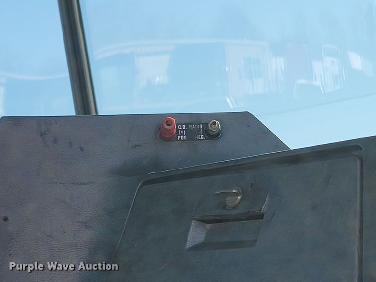 image for item MB9868 1997 Mack DM690S  roll-off container truck