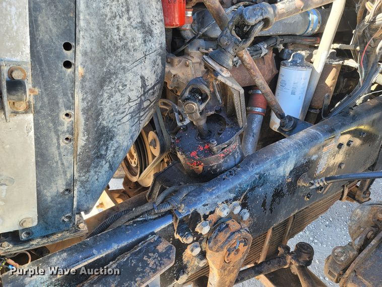 image for item MB9868 1997 Mack DM690S  roll-off container truck