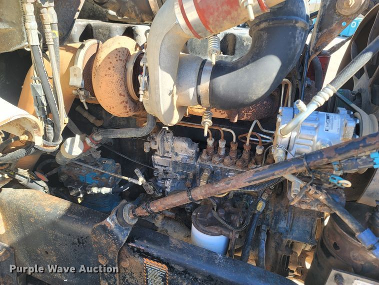 image for item MB9868 1997 Mack DM690S  roll-off container truck