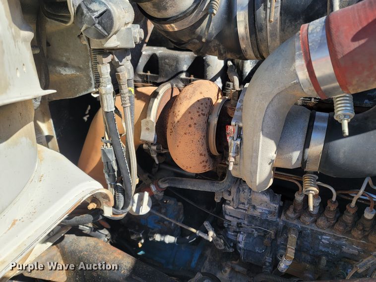 image for item MB9868 1997 Mack DM690S  roll-off container truck