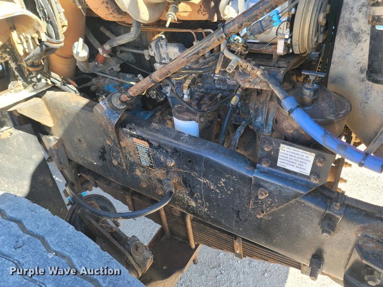 image for item MB9868 1997 Mack DM690S  roll-off container truck