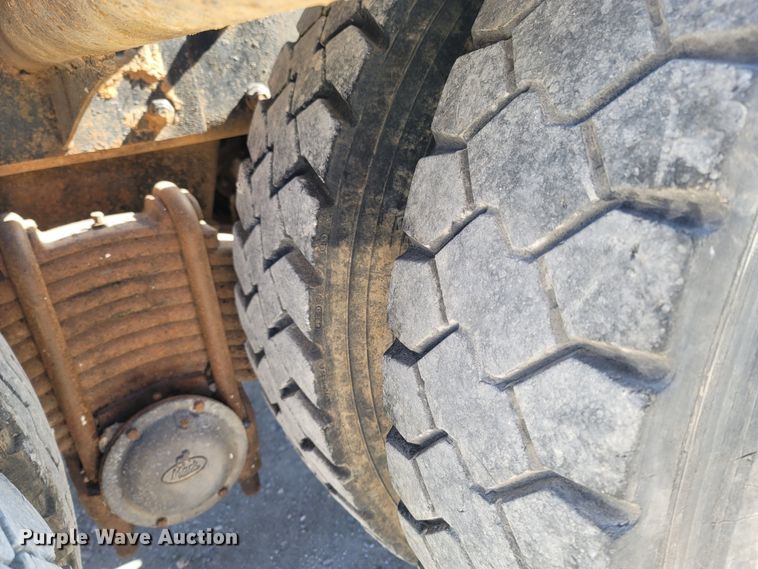 image for item MB9868 1997 Mack DM690S  roll-off container truck