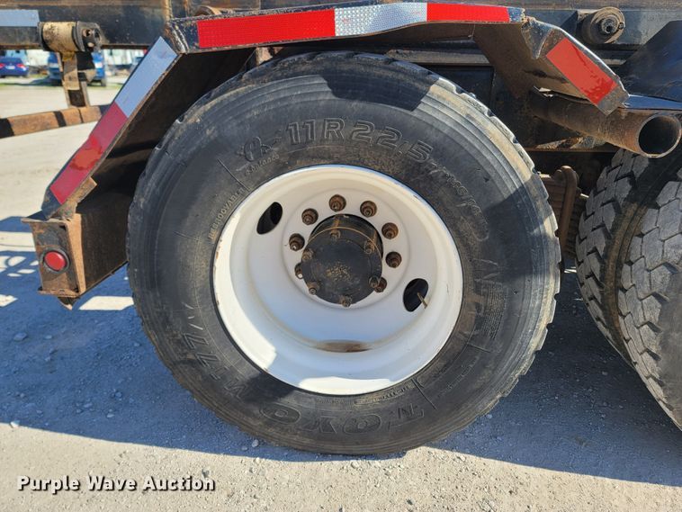 image for item MB9868 1997 Mack DM690S  roll-off container truck