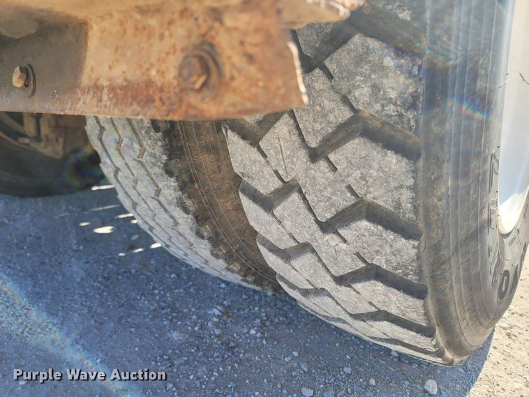 image for item MB9868 1997 Mack DM690S  roll-off container truck