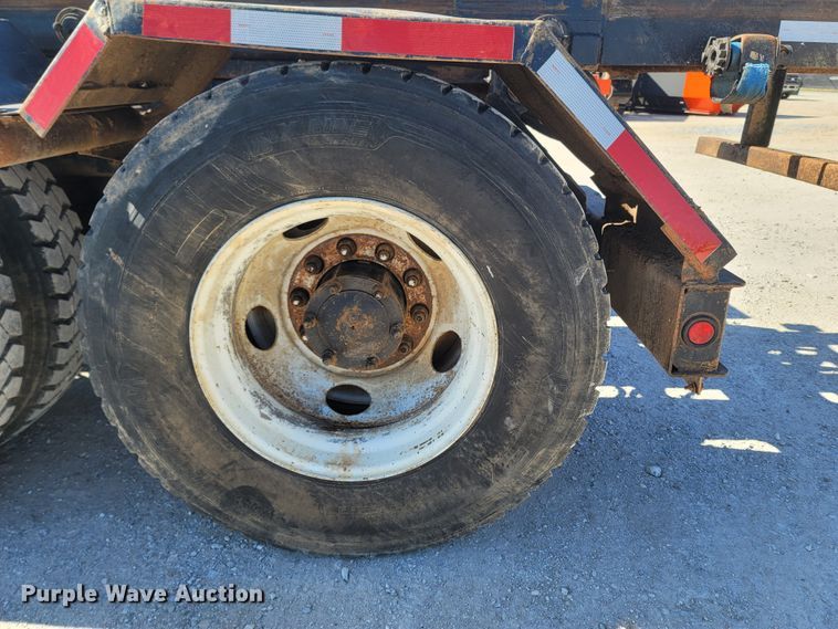 image for item MB9868 1997 Mack DM690S  roll-off container truck