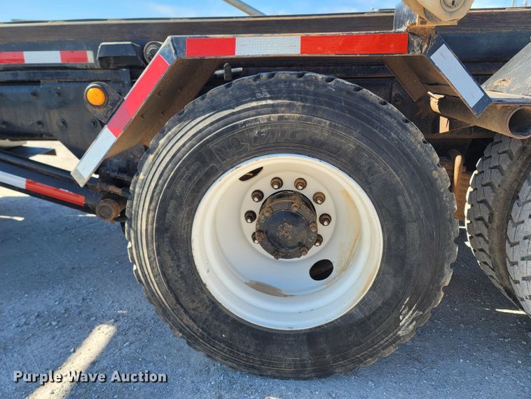 image for item MB9868 1997 Mack DM690S  roll-off container truck