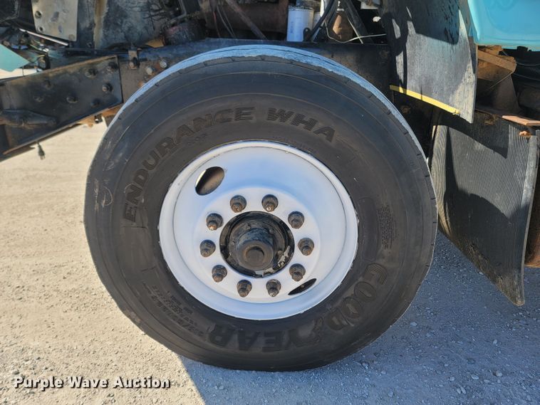 image for item MB9868 1997 Mack DM690S  roll-off container truck