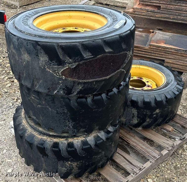 image for item MP9193 (4) 12-16.5 NHS foam filled skid steer tires and wheels