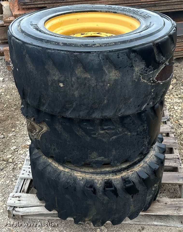 image for item MP9193 (4) 12-16.5 NHS foam filled skid steer tires and wheels