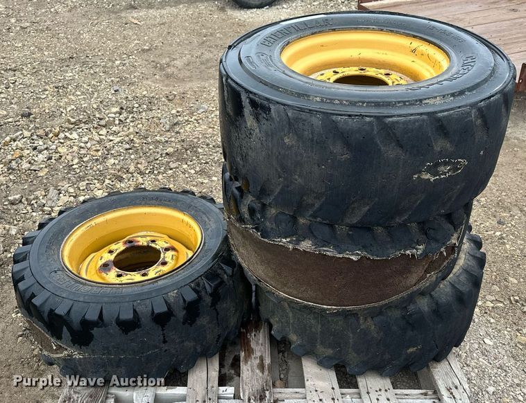 image for item MP9193 (4) 12-16.5 NHS foam filled skid steer tires and wheels