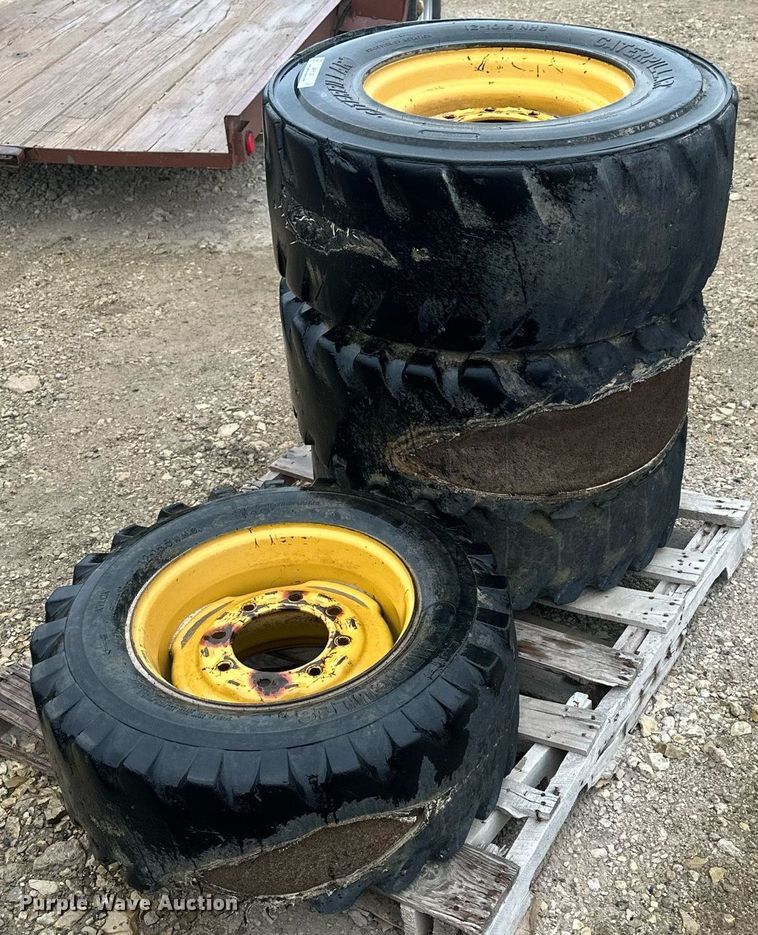 image for item MP9193 (4) 12-16.5 NHS foam filled skid steer tires and wheels