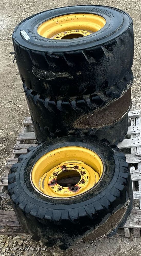 image for item MP9193 (4) 12-16.5 NHS foam filled skid steer tires and wheels